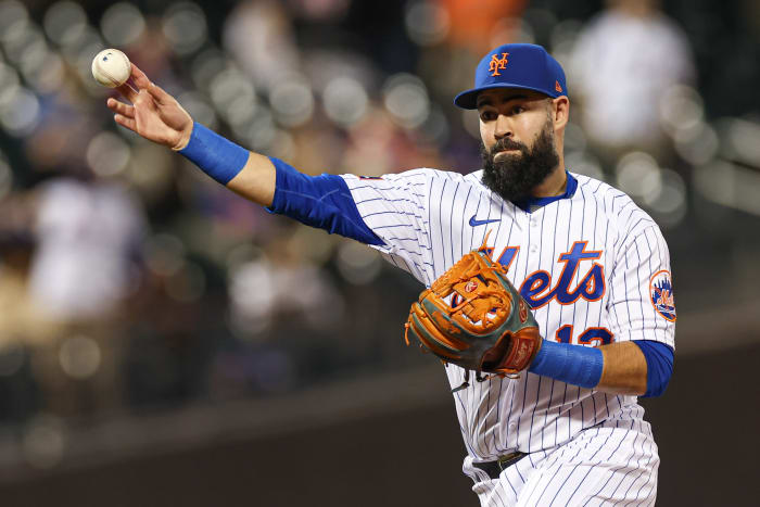 Sep 27, 2023; New York City, New York, USA; New York Mets second baseman Luis Guillorme (13) throws the ball to first base for an out during the ninth inning against the Miami Marlins at Citi Field.